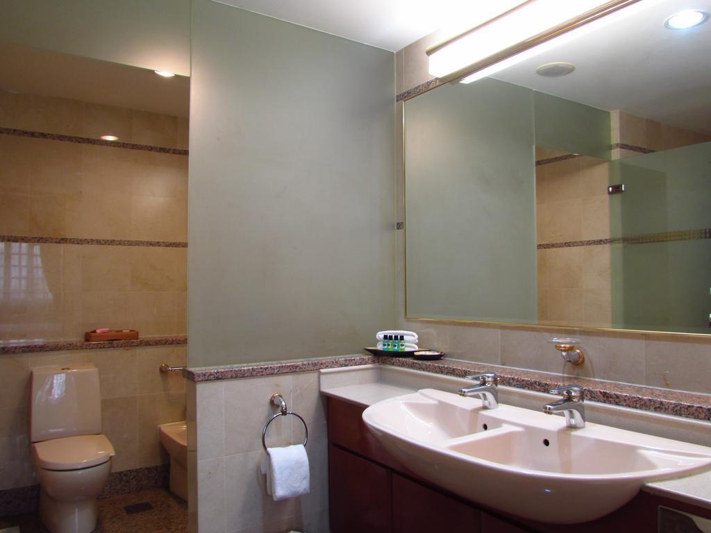 Alocassia Serviced Apartments Сингапур Номер фото