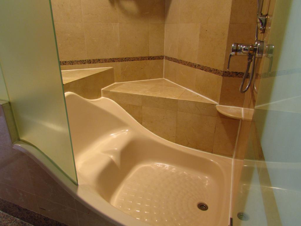 Alocassia Serviced Apartments Сингапур Номер фото